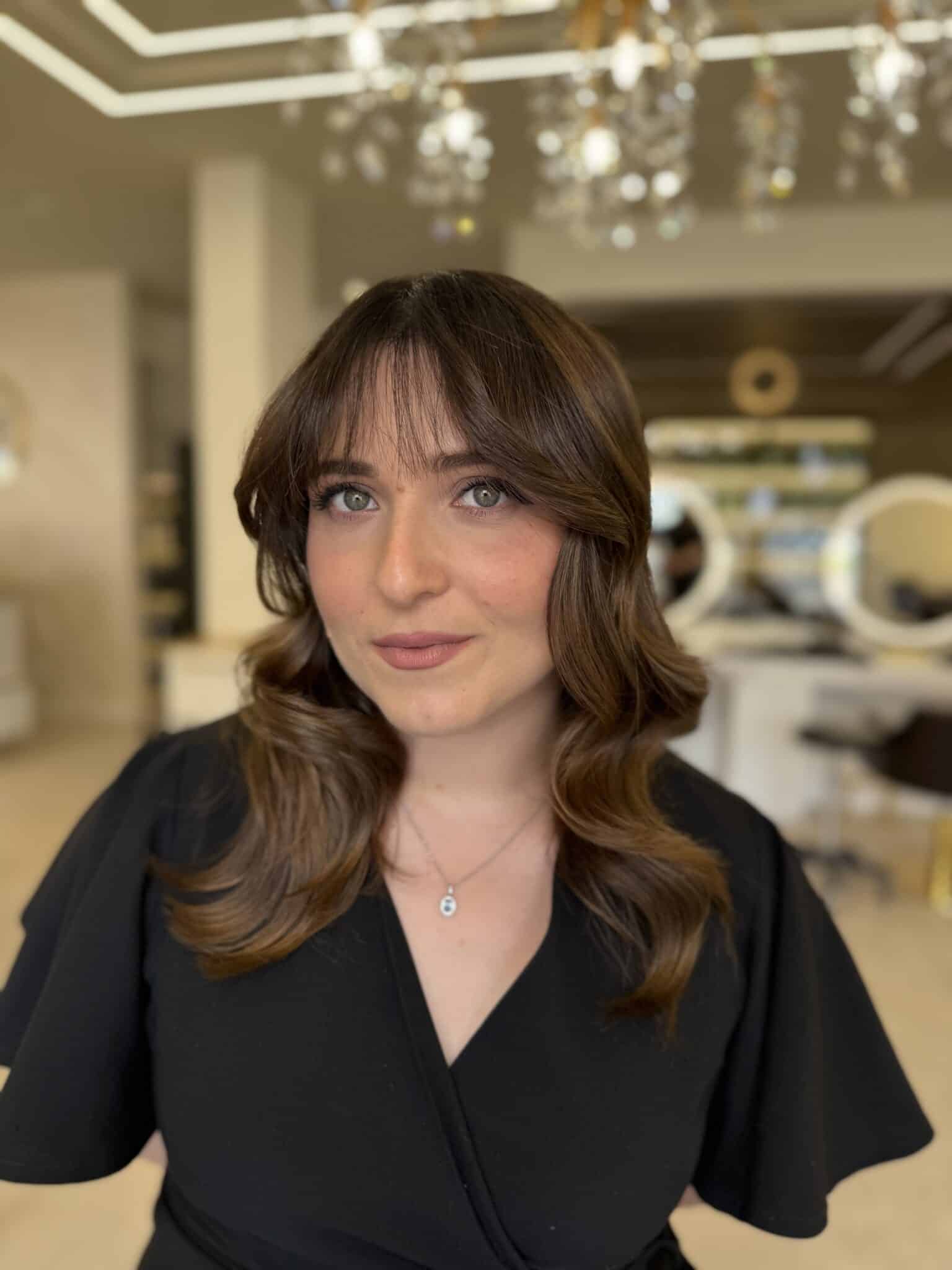 Capelli castani 2026 con riflessi castano moka e mocha brunette realizzati da BROSS Hair Lounge a Monterotondo